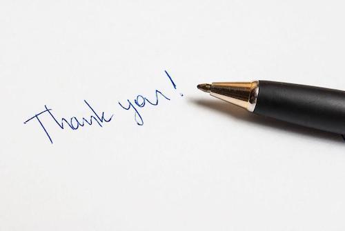 ボールペンで書かれた「thank you」の文字