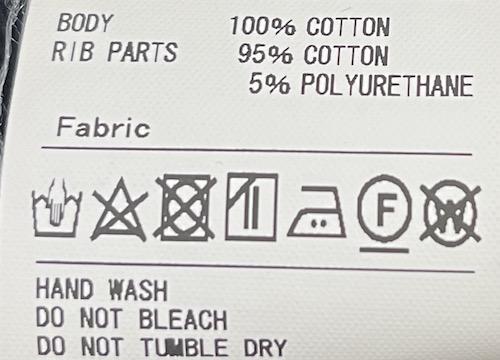 「F」のマークが掲載されている洗濯表示の写真